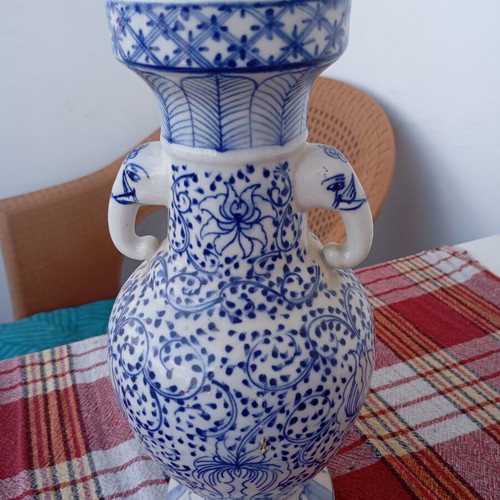 Vintage porcelain vase used, traditional Asian style blue and white Ming Qing design