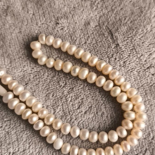 Natural pearl necklace like new, extra pearls for length