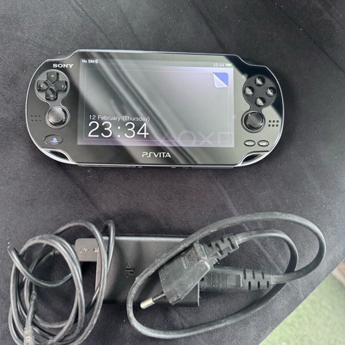 Sony PlayStation Vita 16GB used with SIM card and scratches
