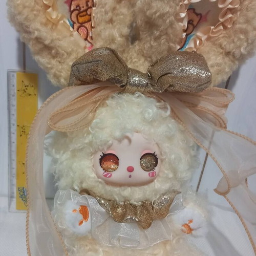 Liila plush bunny with liquid glitter eyes