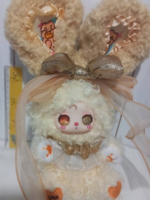 Liila plush bunny with liquid glitter eyes