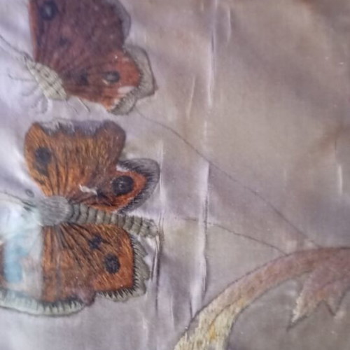Embroidery with angels and flowers on silk or satin, used