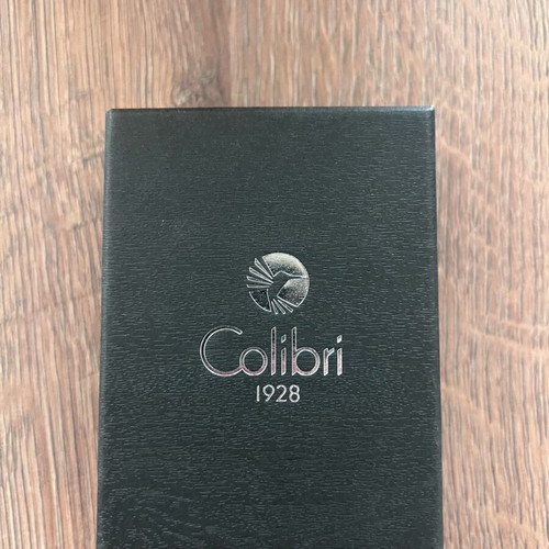 Cigar accessories like new with cedar humidifier, Colibri cutter and Xikar hygrometer