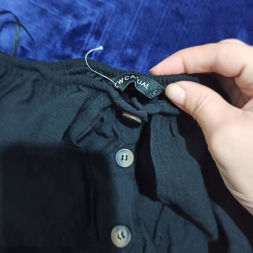 Dress like new black with buttons and ruffles on shoulders