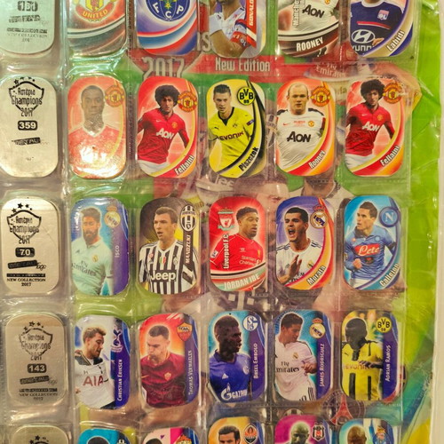 Asteria Champions 2017 collectible album with metal tags used