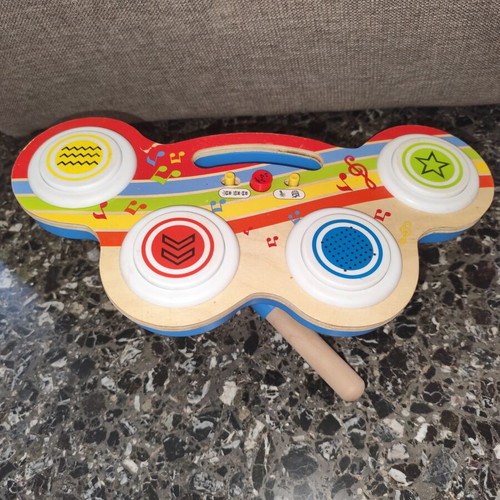Wooden drum toy with music used