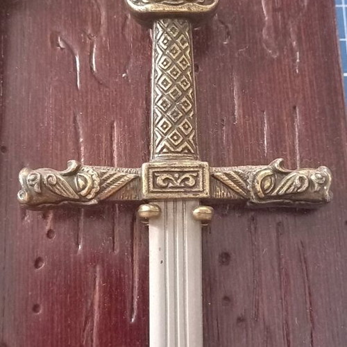 Decorative historical swords used with wooden base and metal mounts