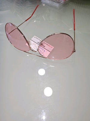 Sunglasses new with pink transparent lens 400UV protection Viaual Care