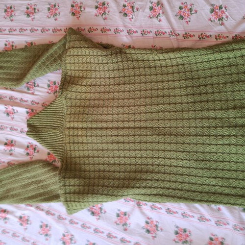 Green pullover with checkered pattern and unique neckline like new
