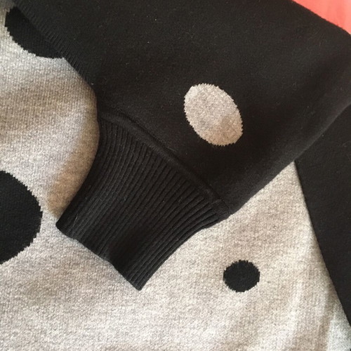 Scarf like new with sleeve in black and gray polka dot design