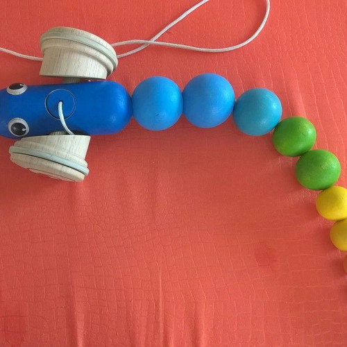 PlanToys wooden pull-along snake like new for 12+ months