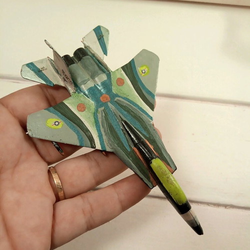 Model airplane used, hand-painted plastic