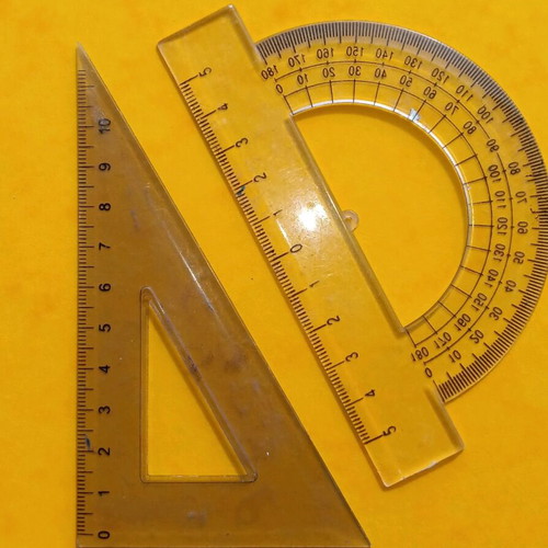 Protractor and set square used, transparent plastic