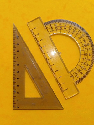 Protractor and set square used, transparent plastic