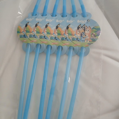 Bluey birthday party set with invitations, straws, cups, knives, and banner