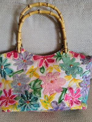 Bag with sequins and wooden handles used, colorful