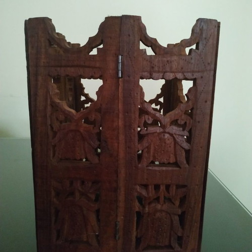 Wooden carved folding decorative item used