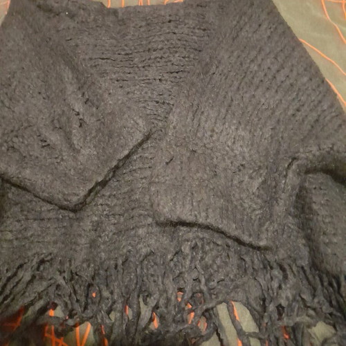 Black women's knitted top with fringes used