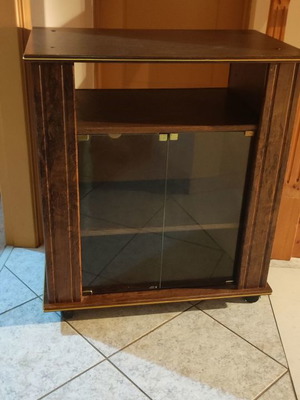Furniture with wheels used with glass doors