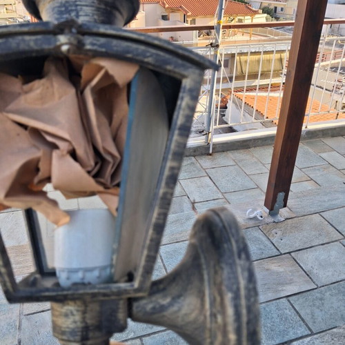 Outdoor wall lantern used, metal bronze patina with glass sides