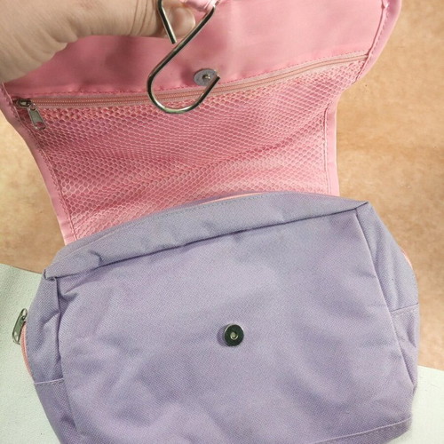 Toiletry bag like new with metal hook, pink and purple
