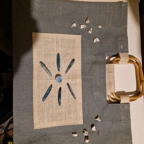 Straw handbag used with shells