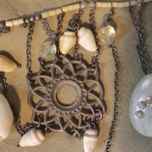 Accessorize necklace new with mother of pearl, shells, crystals, and metal details