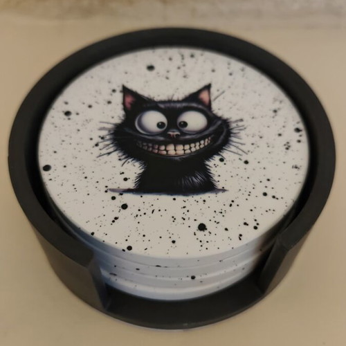 Handmade coasters with black base and 4 playful cat designs