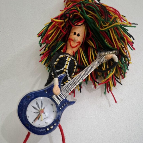 Vintage Table Clock Rastaman Figurine with Guitar like new