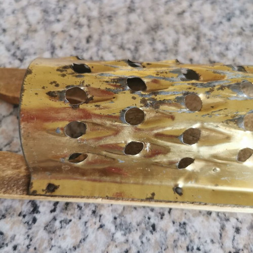 Traditional grater used for quince and hard cheese