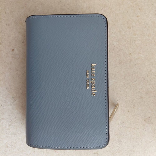 Kate Spade wallet new, turquoise with multiple card slots