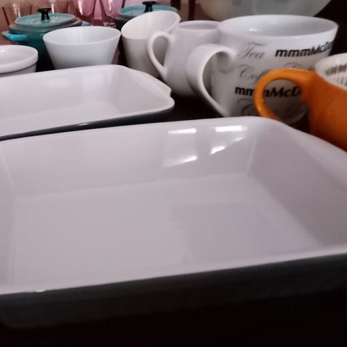 Porcelain kitchenware set with ovenproof cookware, cups and shot glasses