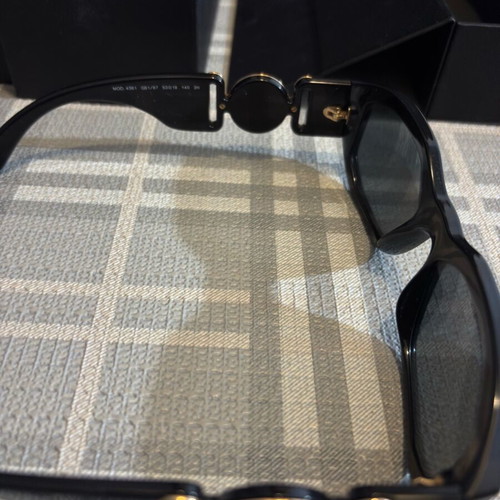Versace sunglasses for women like new, black and gold