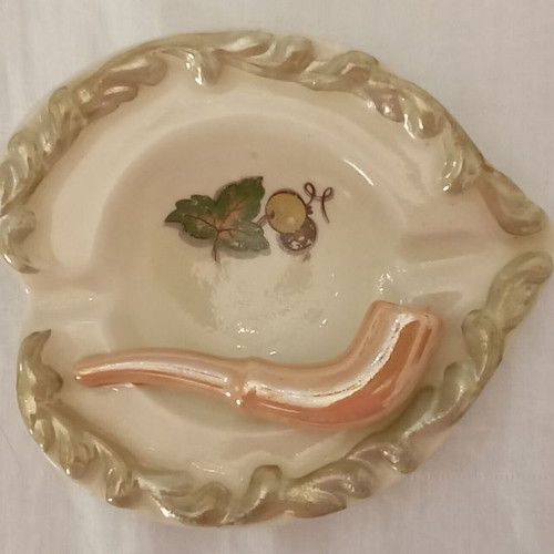 Handmade Art Deco ashtray used from the 1950s with inset pipe