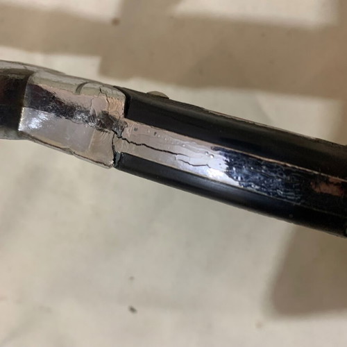 Decorative knife used with sheath and cracked aluminum handle