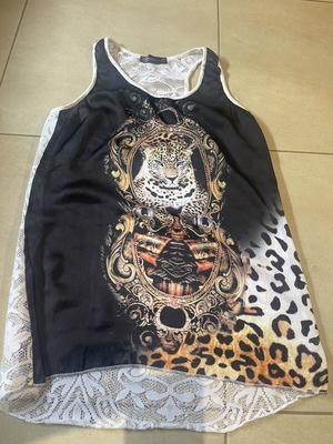 Anel sleeveless shirt with leopard print and lace back like new, size M