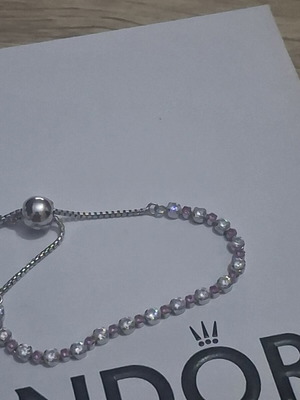Pandora Riviera bracelet like new with pink and clear zircon stones and sapphire