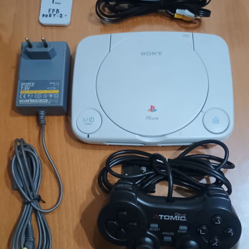 PSone slim console with third-party memory card and controller