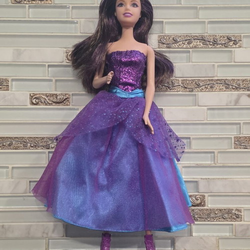 Barbie in A Fashion Fairytale doll like new, missing small accessories