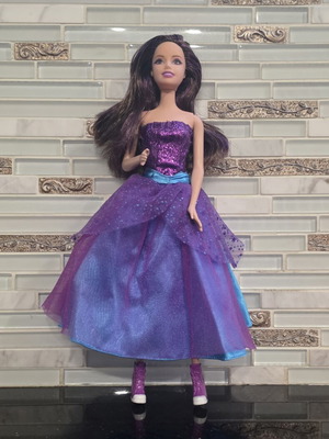 Barbie in A Fashion Fairytale doll like new, missing small accessories