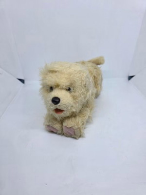 Plush dog toy that moves and makes sounds