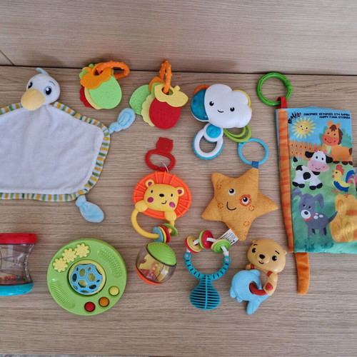 Baby toys like rattles, teethers and soft activity books, like new
