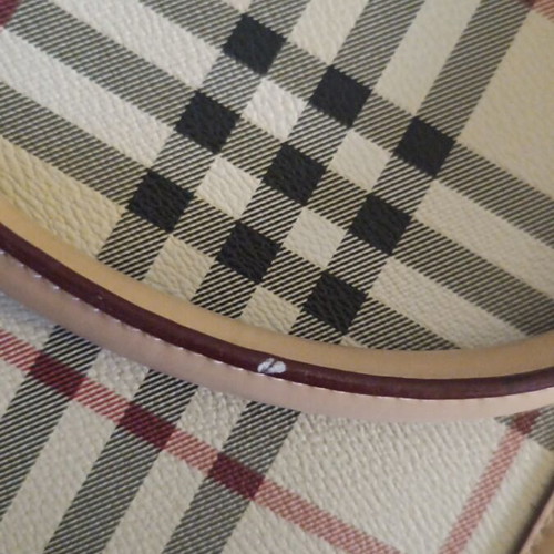 Handheld bag checkered in very good condition