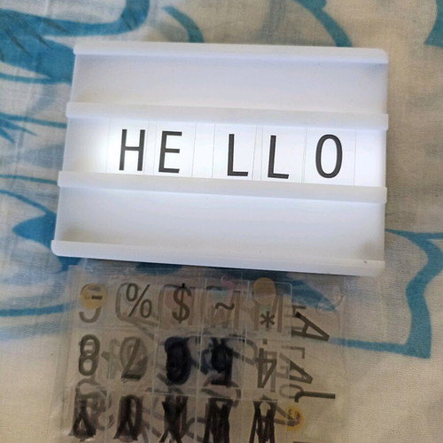 Table lamp with plastic letters used