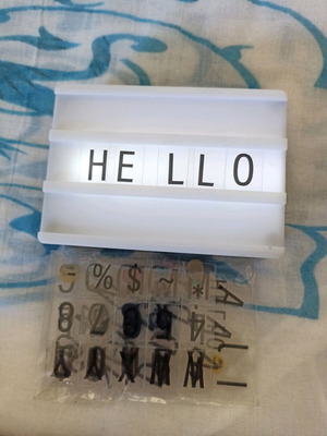 Table lamp with plastic letters used