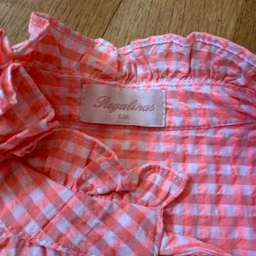 Regalinas checked sleeveless blouse like new with ruffles and tie
