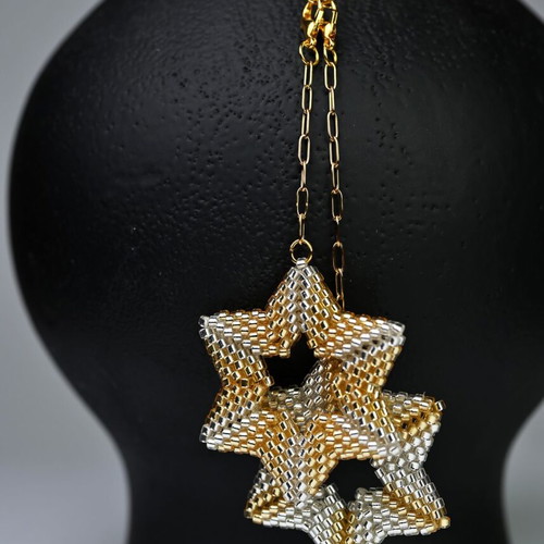 Necklace with two star pendants in white and gold custom made