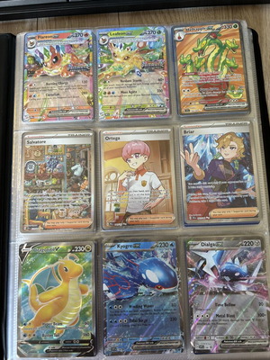 Pokemon cards binder with mixed EX and holo sets