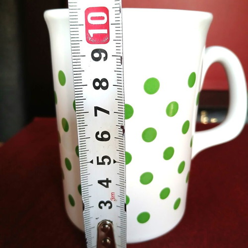 Porcelain mug, English made, signed by creator
