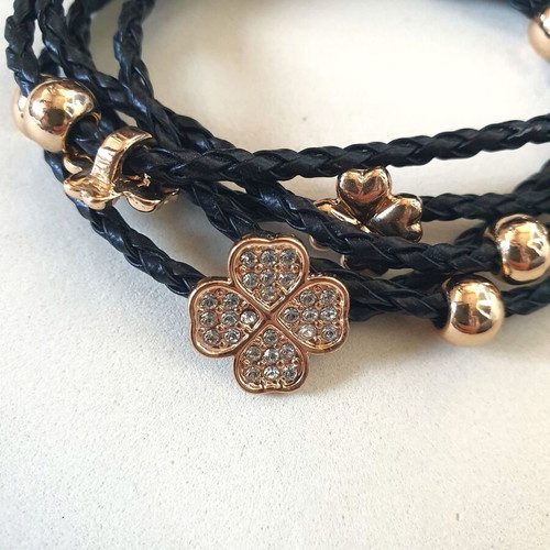 Black braided bracelet with gold beads and crystal clover like new